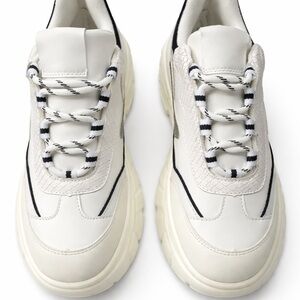 Chic Cream and Black Lace-Up Sneakers